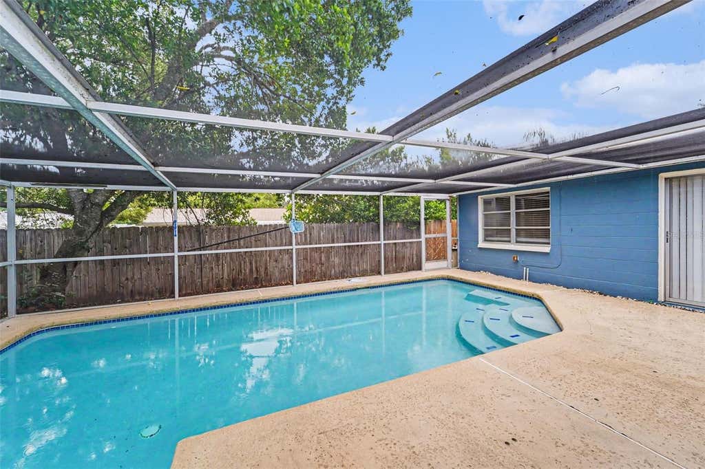 Photo of 9540 Rainbow Lane, Port Richey, FL 34668 (MLS # O6434421)