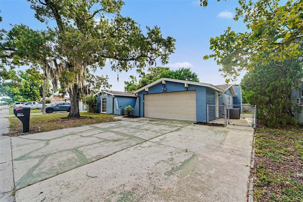 Photo of 9540 Rainbow Lane, Port Richey, FL 34668 (MLS # O6434421)