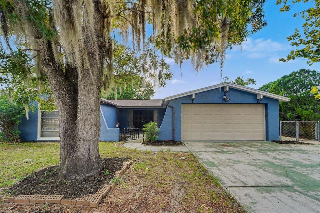 Photo of 9540 Rainbow Lane, Port Richey, FL 34668 (MLS # O6434421)