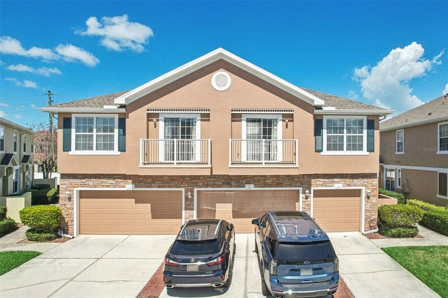 Welcome to Bay Breeze Cove, where comfort, convenience, and low-maintenance living come together in this beautifully updated end-unit townhome. Situated above a one-car garage with both a private formal entry and keyless coded access, this turnkey two-bedroom, two-bath home offers privacy and ease from the moment you arrive. Step inside and head upstairs to a bright, open living space featuring soaring cathedral ceilings and an abundance of natural light. Luxury vinyl plank flooring, replaced in 2022, flows seamlessly throughout, complemented by updated light fixtures that add a fresh, modern touch. The open-concept layout effortlessly connects the living and dining areas, creating an inviting space perfect for both everyday living and entertaining. The kitchen offers a timeless design with granite countertops, solid wood cabinetry, stainless steel appliances, a closet pantry, and a convenient built-in desk and bar seating. The split bedroom floorplan provides ideal privacy, with the spacious owner’s suite featuring a private en-suite bathroom complete with dual sinks, an updated vanity, a soaking tub and shower combination, and a separate water closet. The second bedroom is thoughtfully positioned near the guest bathroom and indoor laundry room. Recent updates include a brand new roof and gutters (2025), a new water heater (2023), fresh exterior paint (2025), and added storage shelving in the garage, providing both peace of mind and functionality. Affordable HOA fees cover exterior maintenance, building insurance, roof, lawn care, pest control, property management, and access to the community pool. Residents also enjoy a welcoming, pet-friendly environment with a gated dog park and a spacious outdoor pool area perfect for relaxing or gathering with neighbors. This is one of St. Pete's most connected locations, just minutes from 4th Street's dining scene, downtown St. Petersburg, Gulf Coast beaches, and Tampa International Airport. With quick access to I-275, Gandy Boulevard, and downtown St. Petersburg, this home places you right in the heart of it all while still offering a quiet, community feel. This is the perfect opportunity to enjoy a move-in ready home with style, updates, and an unbeatable location.