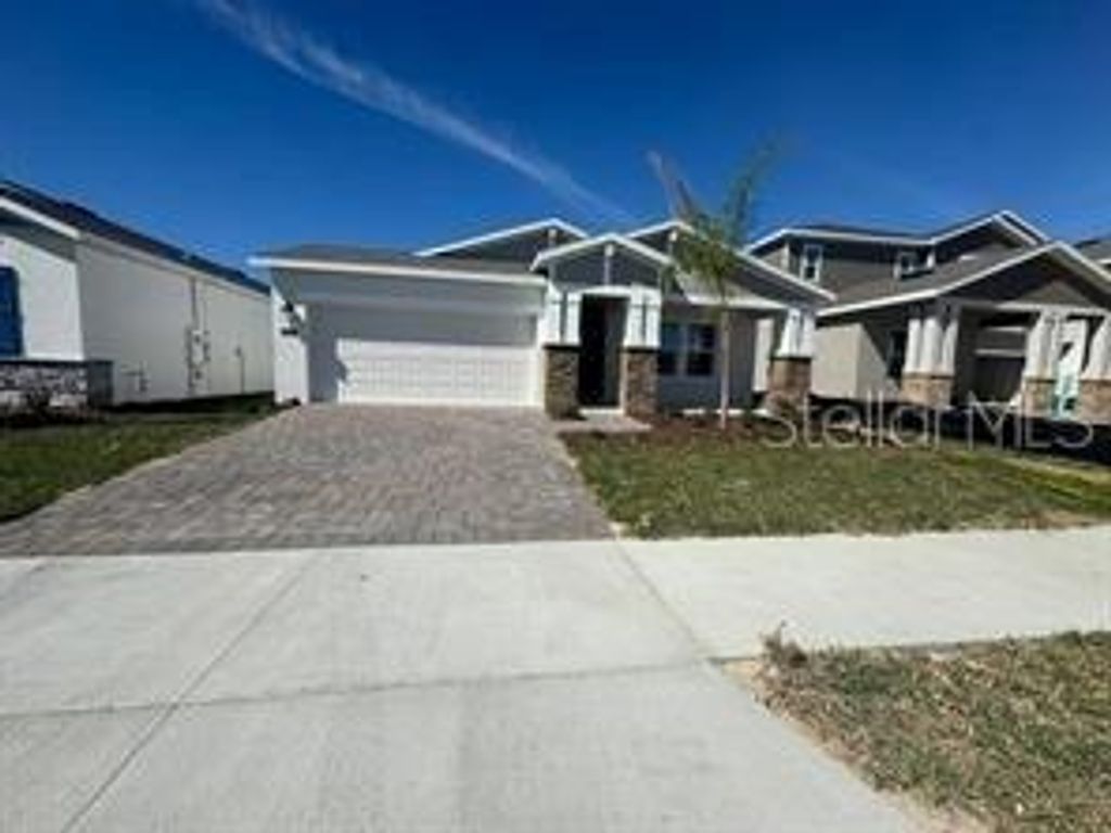 Photo of 2599 Runners Circle #A, Clermont, FL 34714 (MLS # O6400357)