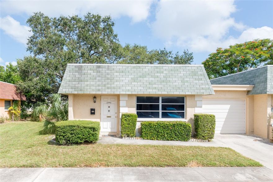 Are you looking for your retirement paradise or just fleeing the northern winters? If so, this 55+ community is the place for you! As you enter the front door you will immediately notice the new water- proof vinyl flooring and the open floor plan. The living area flows into the kitchen. The large open area adjacent to the kitchen can be used as a dining area, additional living area or office space.  As you enter the home to your right there is a half bathroom for your guests. As you continue through the living area the master bedroom is on the right. This condo is an end unit and also does not have any units behind the condo. There is an abundance of closet space with a large bedroom closet, a walk-in closet in the hallway and an entry closet as you walk in the front door. The community has a resort-like pool and large club house as well as shuffleboard courts and horseshoe pits. The Condo association fee includes Spectrum cable and internet, as well as exterior yard maintenance, water, sewage and garbage. The AC unit and water heater are only 5 years old. The Electrical Panel was replaced in December 2022. The roof is only 8 years old and the responsibility of the condo association when replacement is needed. Did I mention that you are only a 15 minute drive to beautiful Gulf beaches? There are also many restaurants and shops nearby.