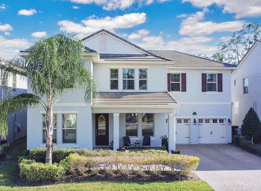 Welcome to your new home. This Kallan model is built with concrete block on both floors, belongs to the elegant Emerald Series with tile roofs and sits on a rare and extraordinary 60x315-foot lot, one of the largest lots in the entire neighborhood, in the highly desired Waterleigh community, offering conservation views and no rear neighbors. The impressive foyer leads your eyes to a beautiful wood and glass door that opens to the private office. Directly in front, you will find a guest bedroom and a full bathroom with a glass-enclosed shower.
Just a few steps in, the space opens to a bright family room with an open-concept layout and a gourmet kitchen featuring modern 42-inch cabinets and an elegant backsplash. The butler’s pantry connects conveniently to the kitchen, and the dry bar extends your storage and serving space. The dining room offers serene views, while the family room opens to the covered lanai, perfect for cozy moments with family and friends.
This home also offers the advantage of an additional full bathroom on the first floor with direct access to the backyard. The oversized backyard is a canvas to design the pool of your dreams, an outdoor summer kitchen, an extended covered patio, a gazebo, or even a sports area—there is space for everything you can imagine. The home features high ceilings with tray ceilings and a practical drop zone fully equipped with cabinets to keep your daily life organized. The 3-car tandem garage includes a spacious super storage area to help maintain visual order.
The second floor features the remaining 4 bedrooms, 3 additional bathrooms, and a spacious loft. The comfortable owner’s suite includes a balcony overlooking the conservation area. The primary bathroom is generously sized and offers separate spaces for him and her, a glass-enclosed shower, and a relaxing soaking tub. The bright loft can serve as a family TV room. The next bedroom is quite spacious and includes a walk-in closet and its own private bathroom—ideal for a child or family member seeking independence. The additional two bedrooms share a bathroom with separation for added privacy between the toilet/tub area and the vanity space. The laundry room includes a washer, dryer, a utility sink, and cabinets that provide abundant storage for linens and cleaning supplies.
The community offers three beautiful clubhouses, four resort-style pools, three fitness centers, putt-putt golf, beach volleyball, tennis courts, a lake-view BBQ area, dog park, open play fields, walking trails, and so much more. Living here is a lifestyle. The community also includes an elementary school and a middle school within the neighborhood, and the high school is just two miles away. The recently opened Publix adds convenience, and the home is only six minutes from Flamingo Crossings by Disney, where you’ll find restaurants, gas stations, shipping offices, Target, convenience stores, hotels, and everything you need. The community is neighboring Disney and provides quick access to Highway 429, which connects easily to the Turnpike, 408, 417, and I-4.
Seeing this beautifully maintained home will make you want to make it yours.