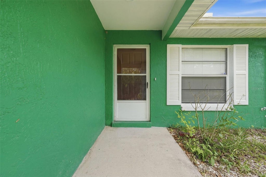 Photo of 515 Floral Drive, Kissimmee, FL 34743 (MLS # O6442372)