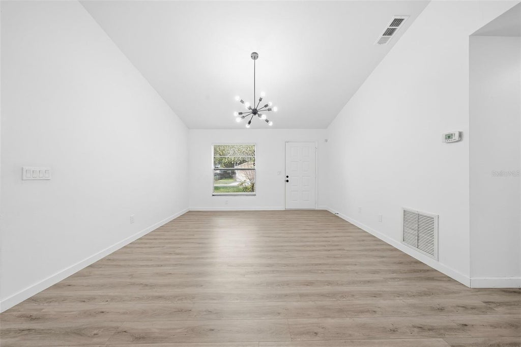 Photo of 515 Floral Drive, Kissimmee, FL 34743 (MLS # O6442372)
