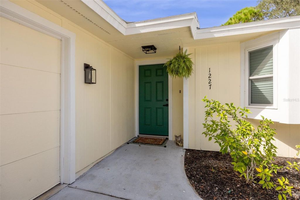 Photo of 1227 Wayne Avenue, New Smyrna Beach, FL 32168 (MLS # O6351015)
