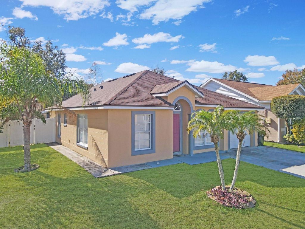 Photo of 6936 Needle Point Drive, Orlando, FL 32822 (MLS # OM716993)