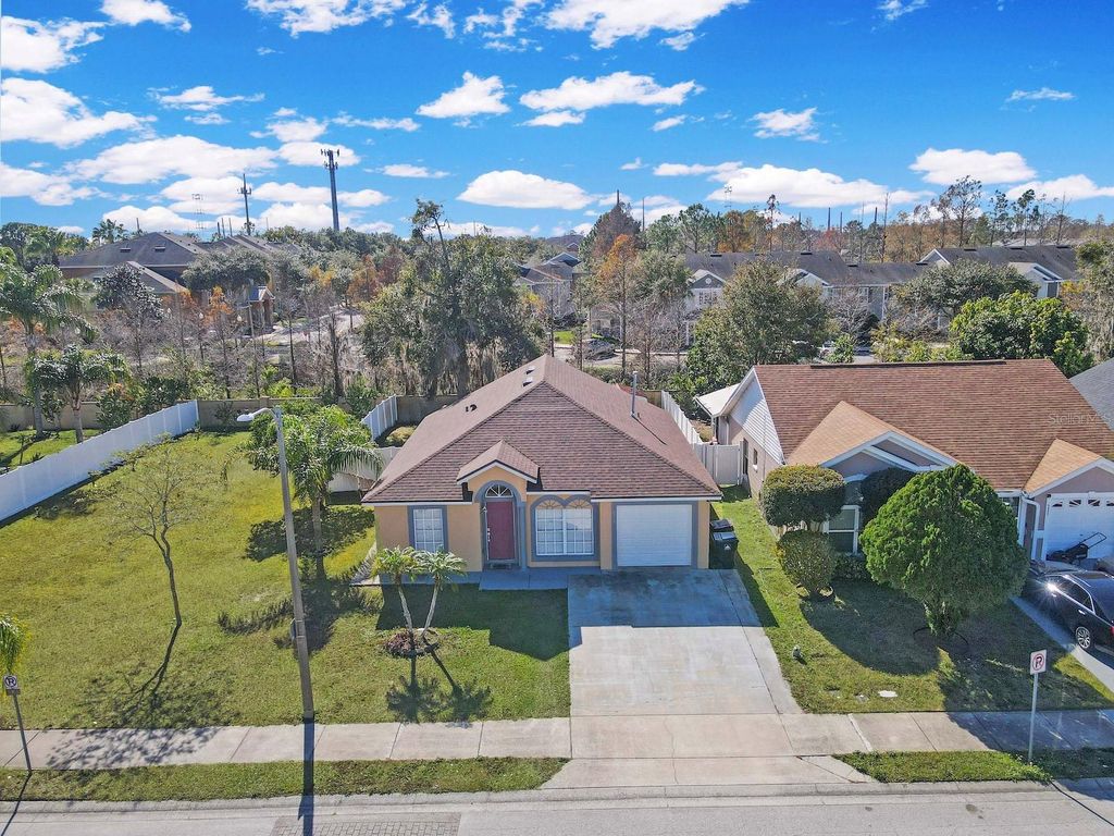 Photo of 6936 Needle Point Drive, Orlando, FL 32822 (MLS # OM716993)