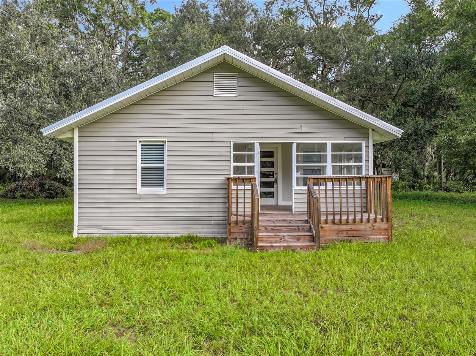 Discover the potential of this 3-bedroom, 1-bath home on a spacious 0.8-acre lot in Gainesville, FL. The interior has been fully remodeled, and a brand-new roof has just been installed. This property is ideal for investors ready to complete the final touches — the remaining tasks include connecting electricity with the city, installing A/C, and adding appliances. Once finished, this home will be move-in ready and a great addition to any portfolio.The expansive lot offers endless possibilities for barns, boat or RV parking, or creating beautiful outdoor living spaces — a major selling feature for future buyers. Don’t miss this rare opportunity for a quick turnaround! As-is CASH ONLY