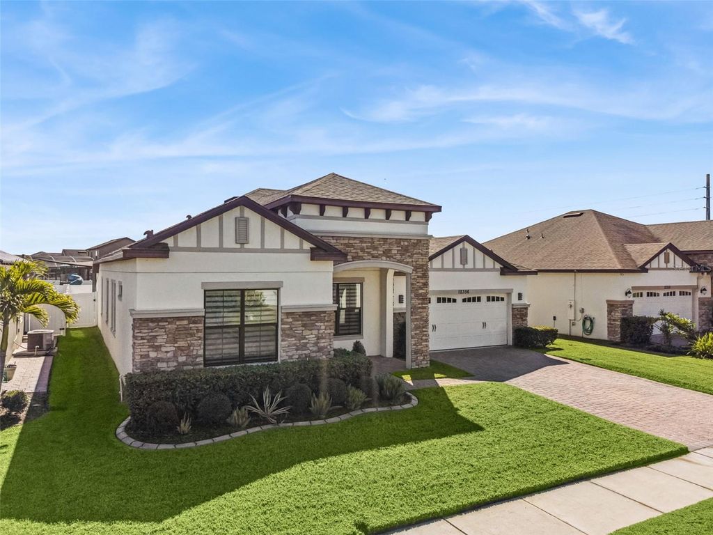 Photo of 12356 Northover Loop, Orlando, FL 32824 (MLS # O6353938)