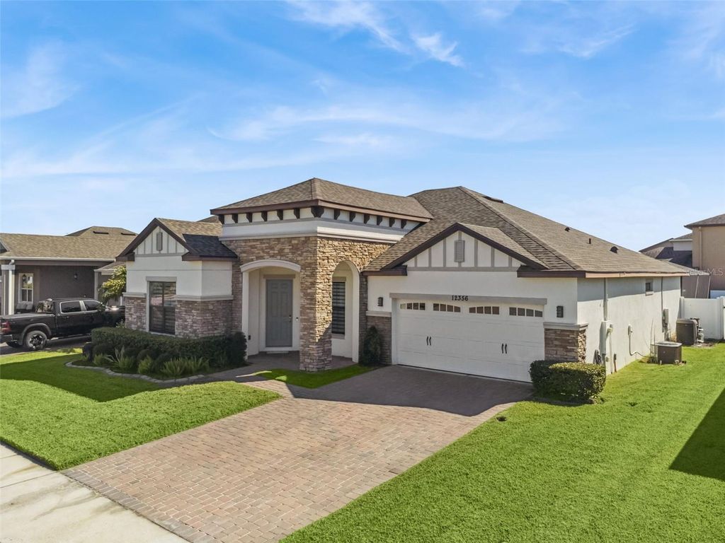 Photo of 12356 Northover Loop, Orlando, FL 32824 (MLS # O6353938)