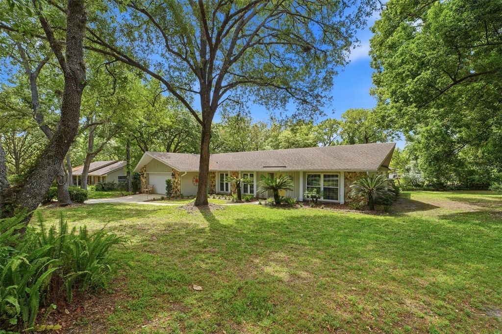 Photo of 210 E Sweetwater Creek Drive, Longwood, FL 32779 (MLS # O6402314)