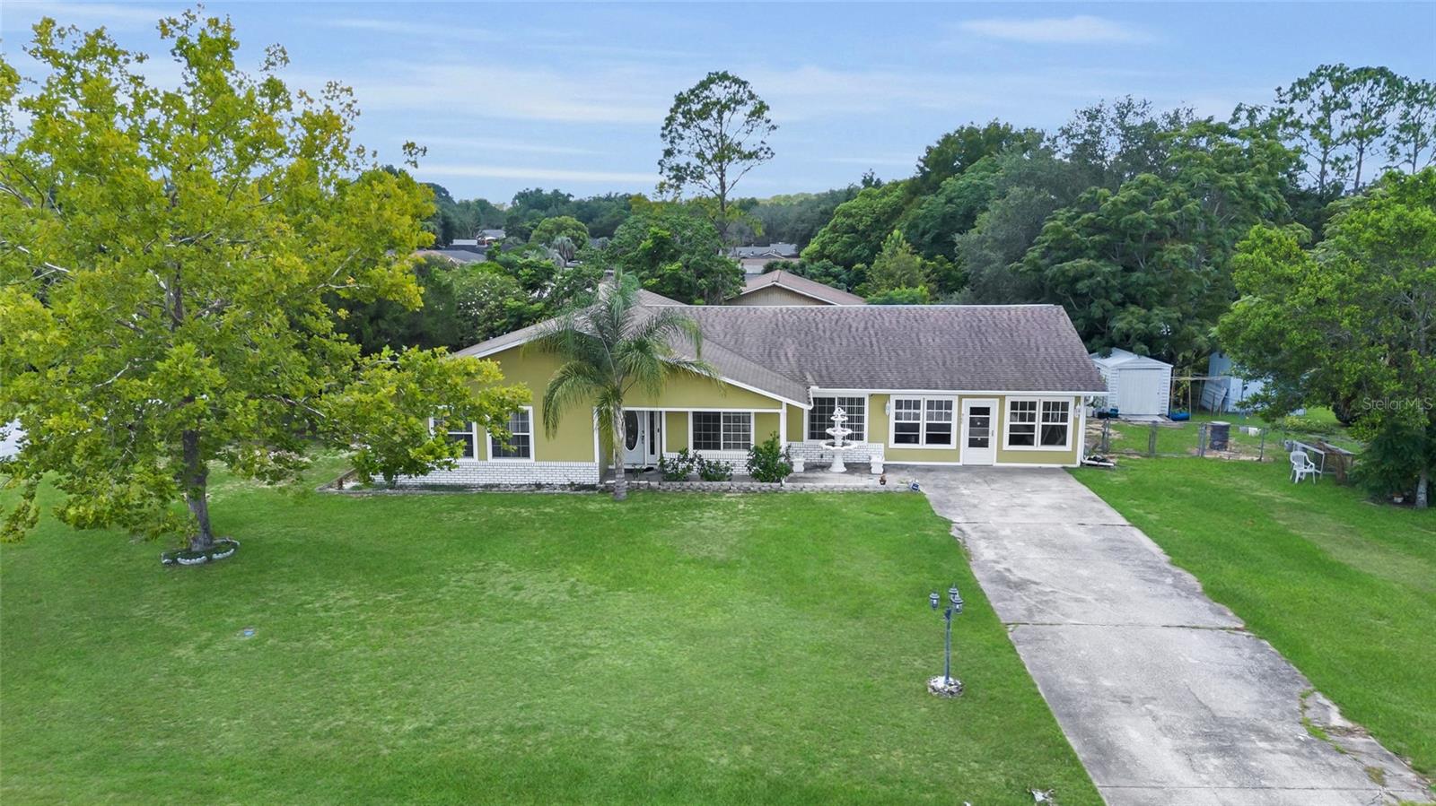 Spacious 3-Bed, 2-Bath Home on Corner Lot in Silver Spring Shores!
Welcome to this beautifully maintained home offering over 2,100 sq ft of living space, perfectly situated on a desirable corner lot in
Silver Spring Shores. This versatile 3-bedroom, 2-bathroom home features a fully enclosed lanai under air—ideal for a home office,
craft room, or flex space to suit your lifestyle.
The garage has also been thoughtfully converted into a second full kitchen and gathering area, perfect for entertaining or
accommodating large family events. The main kitchen is in pristine condition due to minimal use, offering a like-new cooking space.
Both bathrooms have been stylishly renovated within the past six months, and the primary suite boasts double closets for ample
storage. Additional features include a security camera system and installed gutters for added peace of mind.
Outside, enjoy a low-maintenance yard and a storage shed that stays with the home. This move-in ready property offers flexibility,
comfort, and space for all your needs.