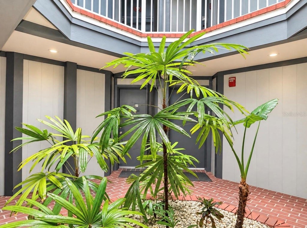 Photo of 3885 Atrium Drive #L3, Orlando, FL 32822 (MLS # O6448948)