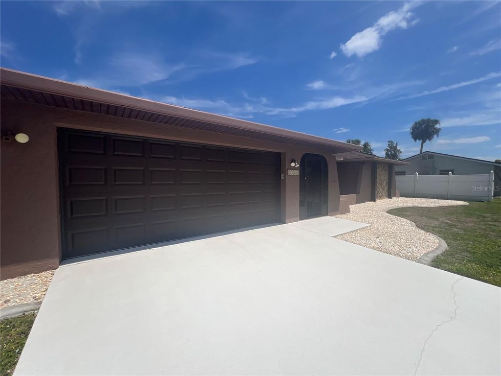 Photo of 21212 Burkhart Drive, Port Charlotte, FL 33952 (MLS # C7524639)