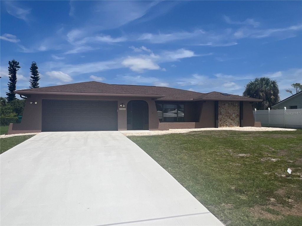 Photo of 21212 Burkhart Drive, Port Charlotte, FL 33952 (MLS # C7524639)