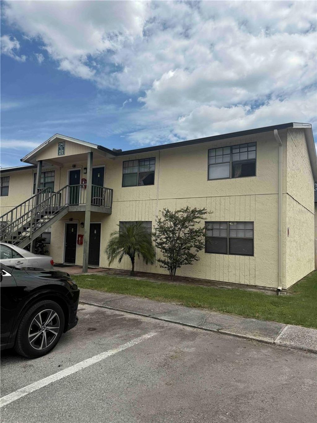 Photo of 12401 Hibiscus Oak Place #101, Tampa, FL 33612 (MLS # TB8449083)