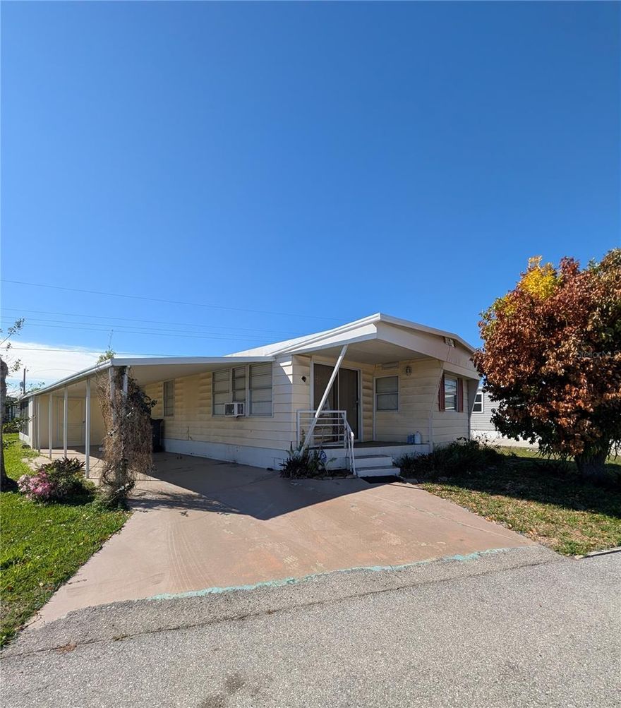 All ages welcome, land owned, low HOA fees!
The home has great potential with some TLC! This is an expanded single-wide with a detached, screened patio in the back. 
This home is centrally located to everything. Close to shopping, golfing, medical facilities, beaches, entertainment, Sarasota, Tampa, ST. Pete., and much more.