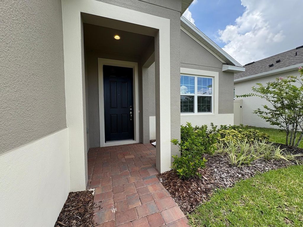 Photo of 366 Siwtchgrass Loop, Clermont, FL 34715 (MLS # TB8511071)