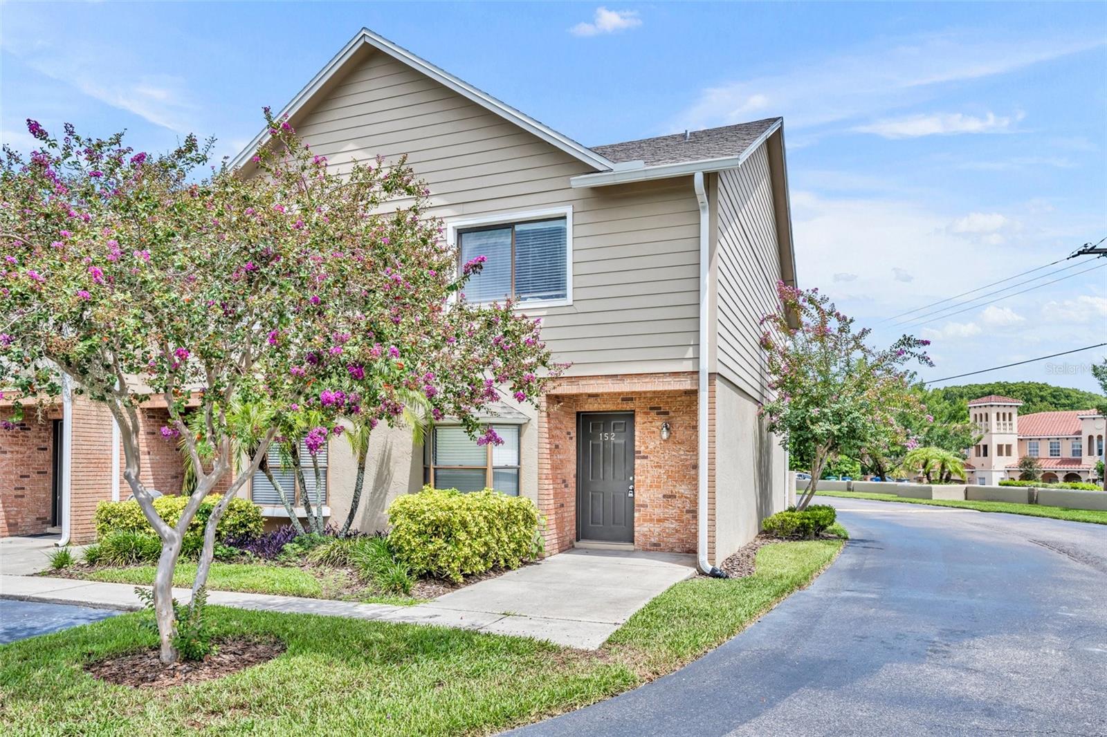 Lovely, light and airy home with newer appliances, fresh paint throughout. This end unit townhome has a spacious kitchen with eat-in space, a large bay window that floods the room with natural light. The large living and dining room features a corner fireplace. It also has tile flooring and oversized sliders that open to a private back patio...the pool is a short walk across the yard. There is a powder room on the first floor - so convenient. Classic stairway leads upstairs to 2 spacious bedrooms with en-suite baths. Washer/Dryer are provided in an upstairs laundry closet, no lugging the laundry upstairs. Call for your showing today!