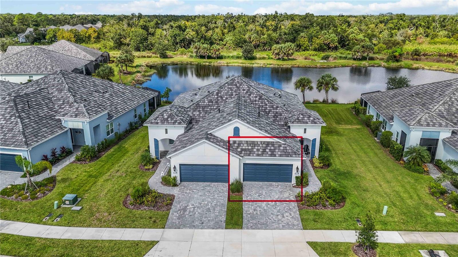 Welcome to your Florida dream home in the highly sought-after Grand Palm community! This 1-year-old villa offers 2 bedrooms, 2 bathrooms, plus a versatile den/office—perfect for working from home or hosting guests. With all builder warranty inspections already completed, you can move in with peace of mind and enjoy the benefits of a nearly new home without the wait.
Set on a truly unique lot, this property boasts breathtaking views of both a beautiful pond and a lush preserve—a rare combination that provides privacy, tranquility, and the perfect setting for nature lovers. Imagine enjoying peaceful mornings on your lanai or winding down in the evening surrounded by Florida’s natural beauty and watching the sunset over the water.
Inside, you’ll find a thoughtfully designed layout with modern finishes, chef’s kitchen with large pantry, open living spaces, and plenty of natural light. Hurricane Impact Windows and Doors, no carpet, and lots of storage are just a few of the perks! Outside your door, there are resort-style pools, hot tubs, a fitness center, dog park, tennis, pickleball, walking trails, and endless opportunities with community planned events to connect with neighbors. Grand Palm is part of Wellen Park, close to downtown and a short drive to Venice or Nokomis Beach.
This villa is more than just a home—it’s a lifestyle. Don’t miss your chance to own one of the most special lots in this community!