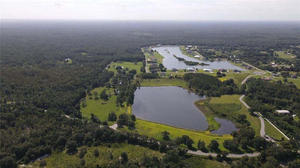 Photo of 10460 Ehren Cutoff, Land O Lakes, FL 34639 (MLS # TB8423493)