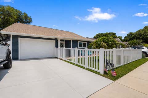 Photo of 3122 Whispering Drive N, Largo, FL 33771 (MLS # TB8522801)