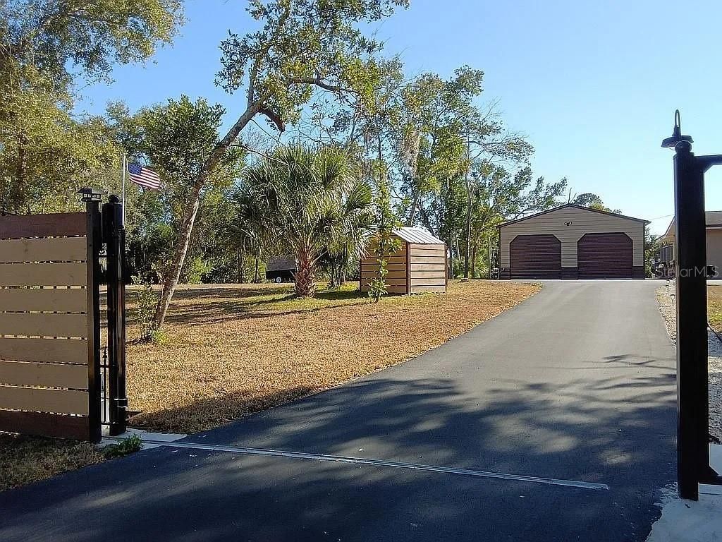 Photo of 758 Buffalo Road, Titusville, FL 32796 (MLS # O6381772)