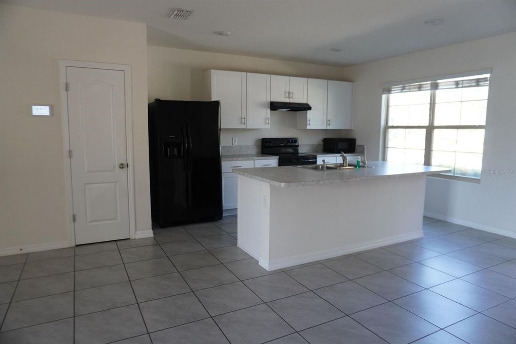 Photo of 1882 Red Canyon Drive, Kissimmee, FL 34744 (MLS # S5137530)