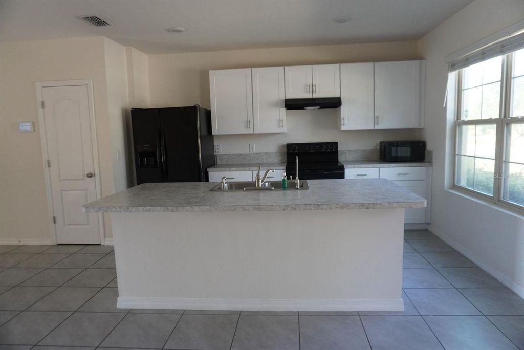 Photo of 1882 Red Canyon Drive, Kissimmee, FL 34744 (MLS # S5137530)