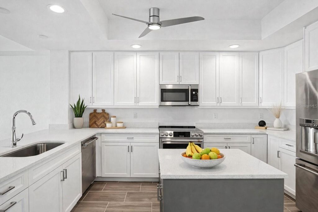 Photo of 125 Island Way #304, Clearwater Beach, FL 33767 (MLS # TB8468545)