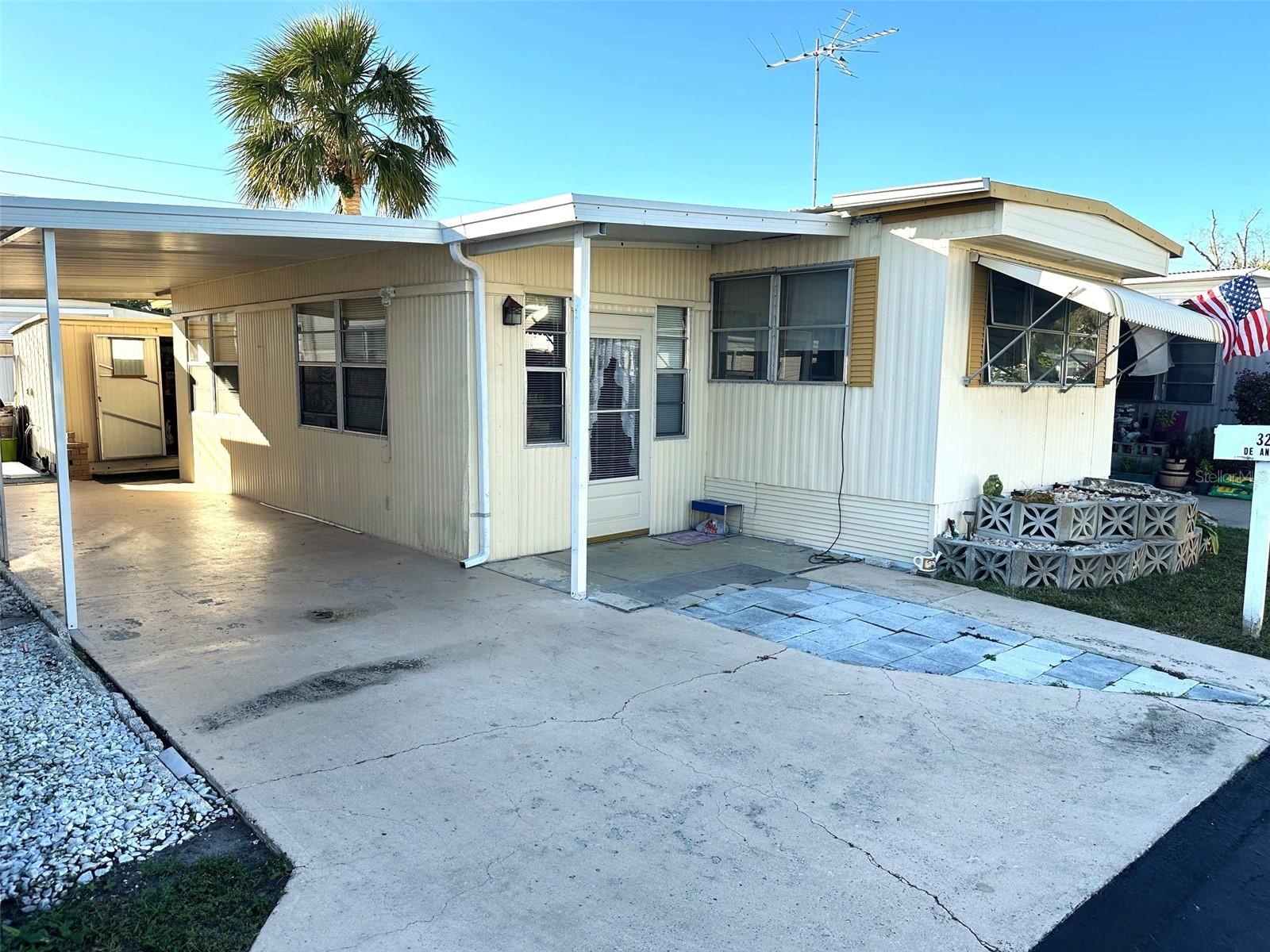 NEW LOW PRICE! Comfortable 12x40, 1 bedroom, 2 bath, with 9x24 enclosed Florida Room to enjoy your Florida Winters! Double Roof, solid laminate and carpet floors, covered parking for 2 cars, and spacious utility storage shed, with 2nd bath! Washer & Dryer included! Furnished and ready to move in! Come see this peaceful & well-maintained 55+ Florida Resident Owned Park, located close to everything you would want! Beaches, airports, golf courses, hospitals, shopping, and the popular fun downtown area! NOW Asking only $38,900., includes the land share! Low $150. per mo. maintenance. fee, covers your water, sewer, garbage, and yard. Cash only purchase.