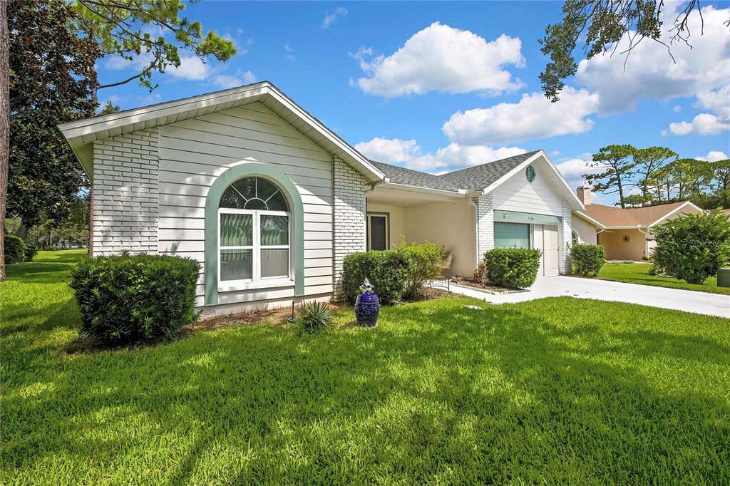 Photo of 7159 Crown Oaks Drive, Spring Hill, FL 34606 (MLS # W7887986)