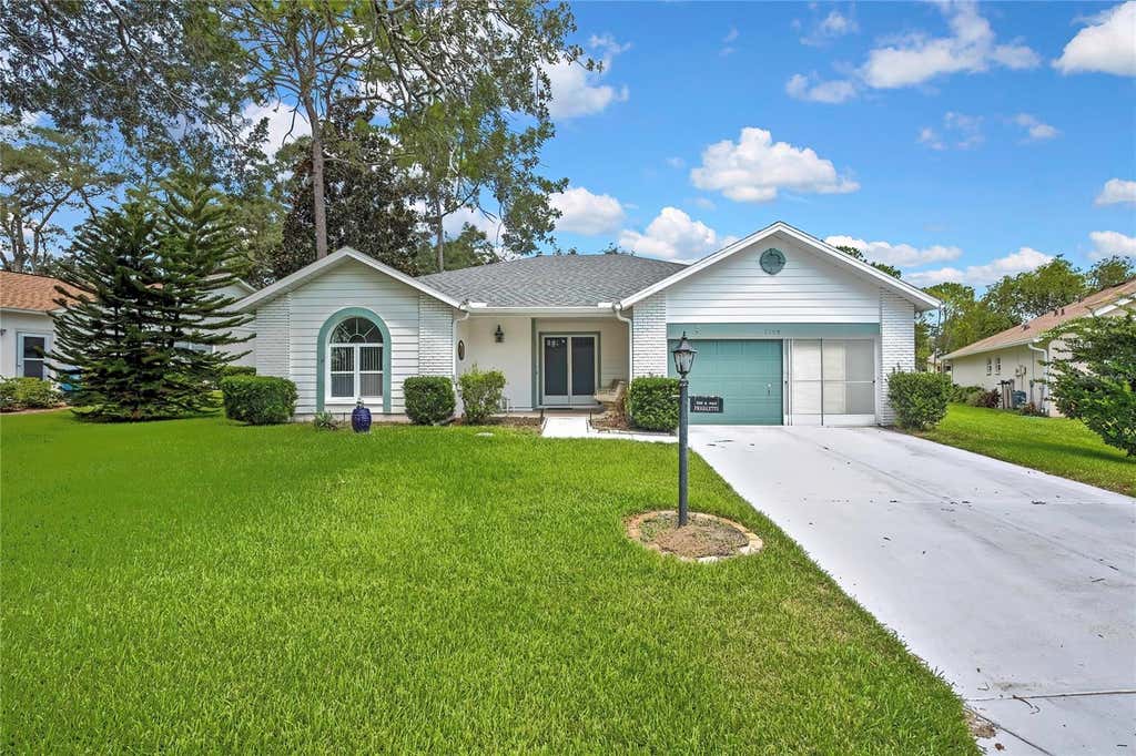 Photo of 7159 Crown Oaks Drive, Spring Hill, FL 34606 (MLS # W7887986)