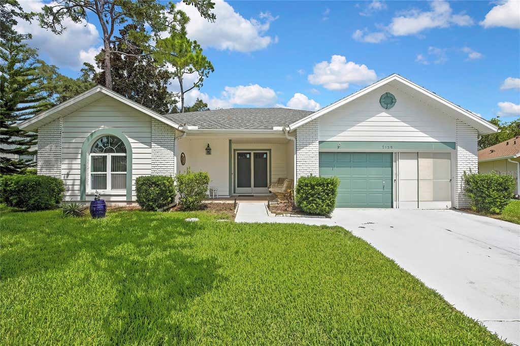 Photo of 7159 Crown Oaks Drive, Spring Hill, FL 34606 (MLS # W7887986)