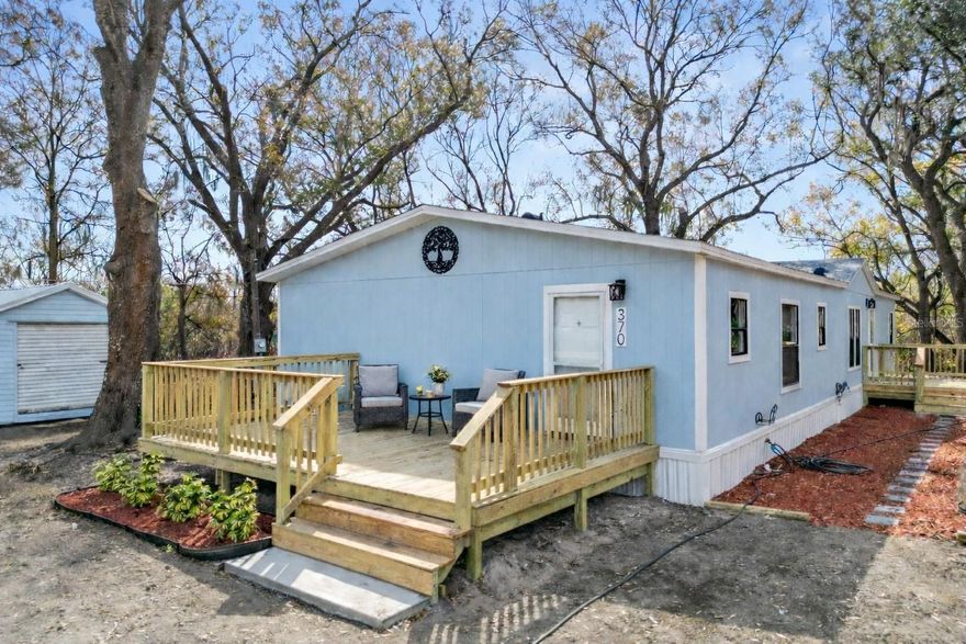 One or more photo(s) has been virtually staged. PRICE IMPROVEMENT + COMPLETELY RENOVATED ON .80 ACRE! Sellers have options for closing costs! Welcome home to this beautifully fully renovated 3-bedroom, 2-bath home that looks and feels like brand-new construction—without the wait or the new-build price. Perfectly situated on .80 of an acre, this property offers the ideal combination of modern upgrades and wide-open outdoor space. Step inside and immediately notice the fresh, stylish finishes and extensive upgrades throughout. The stunning kitchen is the heart of the home, featuring brand-new stainless steel GE appliances, abundant cabinetry, and a large dry bar—perfect for entertaining, a coffee station, or additional prep space. Just off the kitchen, a walk-in pantry with built-in shelving provides excellent storage and organization. Designed for convenience, the spacious indoor utility room includes a brand-new washer and dryer with extra room for a mudroom setup, folding station, or additional storage. The oversized primary suite is a private retreat featuring a freestanding soaking tub, a separate walk-in shower with rain shower system and handheld sprayer, and plenty of space to relax and unwind. Enjoy peace of mind with major system upgrades already completed, including: • NEW Owens Corning “Harbor Blue” shingle roof • NEW HVAC system • NEW septic system and drain field and more! Outside, the expansive .80-acre lot offers incredible freedom and flexibility—bring your boats, RVs, trailers, and outdoor toys with room to spare. The property also includes a storage shed, attractive landscaping, and endless possibilities to create your dream garden, outdoor entertaining area, or future additions. The large lawn is currently in its natural winter dormancy due to recent frost and the new septic system installation, but will soon showcase its full beauty as spring arrives. Move-in ready and fully updated, this property offers modern living, major upgrades, and the space you’ve been searching for—all at a newly improved price. If you’ve been looking for “like-new” without the new construction price tag, this is the one. Schedule your private showing today!