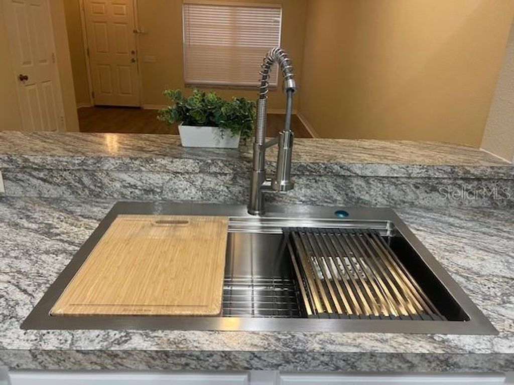 Photo of 1308 Costa Mesa Dr, Wesley Chapel, FL 33543 (MLS # TB8440479)