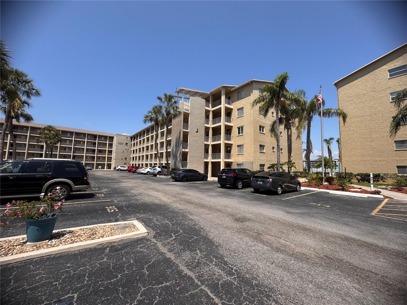 PRICE IMPROVEMENT AND SOLD FURNISHED!! Welcome to a serene corner unit condo, exclusively for residents aged 55 and over. This beautiful 2-bedroom, 2-bathroom home showcases breathtaking water views, providing the perfect setting for a relaxing Florida lifestyle. Whether you're considering retirement, relocation, or simply downsizing, this property offers an unparalleled opportunity. This condo blends elegance and practicality, accentuated by its corner position for prime privacy and views. The renovated bathrooms provide both luxury and modern living standards, while the updated kitchen features newer appliances, countertops, sink, and cabinets designed to inspire your culinary creativity. Find comfort under a new roof replaced in 2023. Located just under 8 miles from world-famous beaches, you can indulge in sunbathing and enjoy the rejuvenating Florida waters nearby. The condo community promotes a carefree lifestyle with amenities that encourage relaxation, social interactions, and an active, healthy living environment. Alongside picturesque waterside views, the property places you within easy reach of major conveniences. Shops, excellent dining, and dynamic local events are just a short drive away, offering you the chance to explore and relish everything in the area.