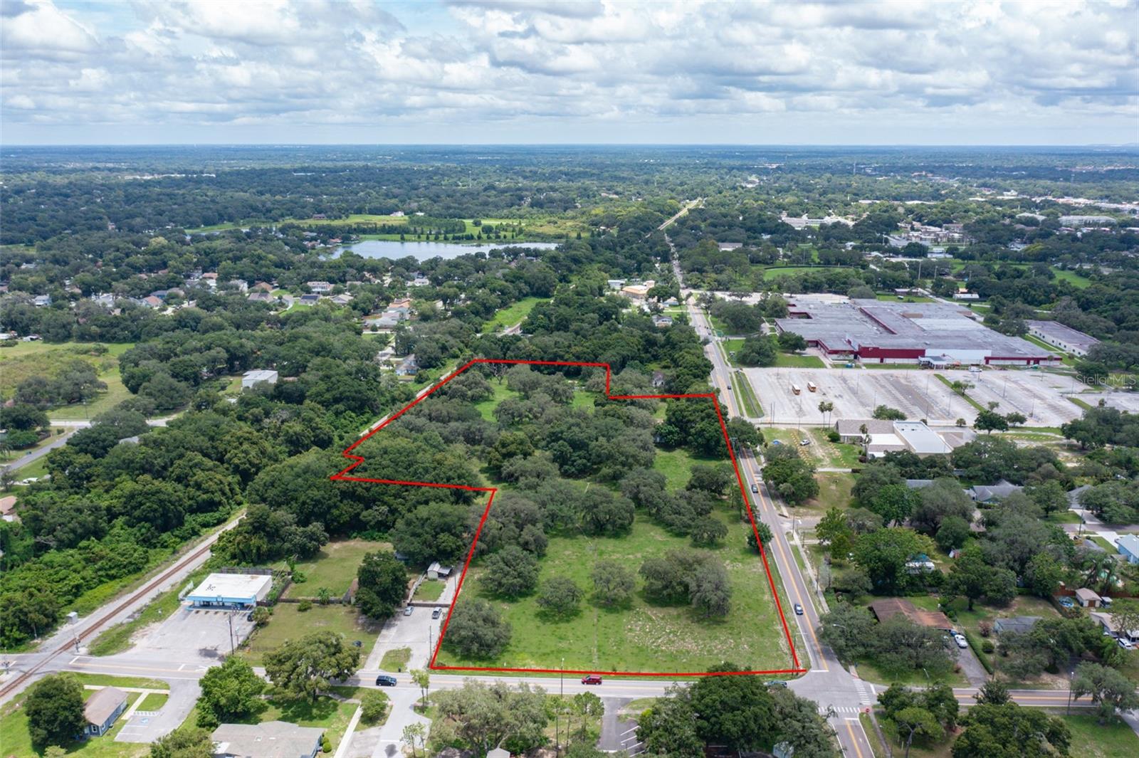 This unique 8.2 +/- acre property is located in the heart of Brandon across from Brandon High School. It includes road frontage on both Victoria and Limona with excellent visibility. There are several possible uses for this property including multi-family, church, assisted living, or single-family homes with rezoning. This property has great access to the interstates and the Crosstown. The property is presently greenbelted and utilities are nearby. The property is located at the Northeast Corner of Limona Road and Victoria Street. The property has a Future land use of Res 9 but the number of units permitted on the property after retention is unknown. Previous attempts to get the full Res 9 have been unsuccessful so the number of units that will ultimately be permitted is unknown.