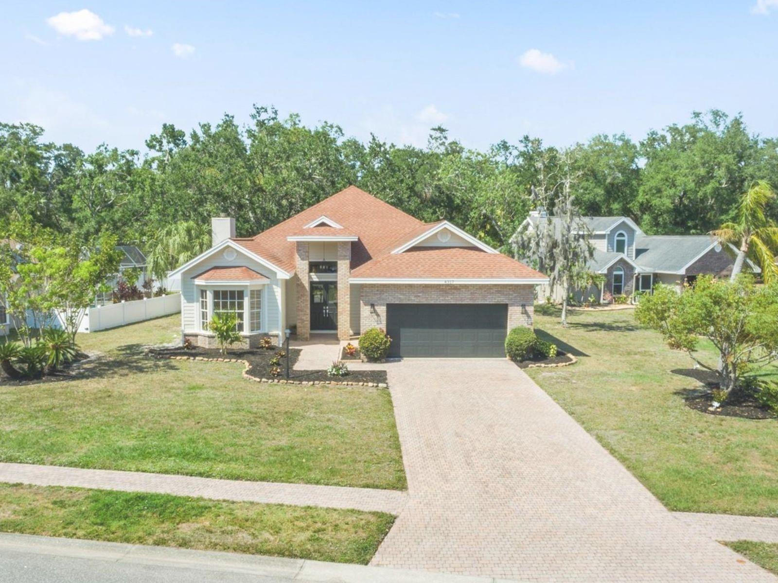 Bring your suitcase and step into a home of luxury—without lifting a finger. This beautifully renovated residence in the sought-after Sarasota neighborhood of Quail Run offers effortless living with high-end finishes throughout.
From the moment you enter through the stylish new glass front door, you are greeted by high ceilings and a wide-open layout that flows seamlessly between the living, dining, and kitchen areas filled with open space and natural light. The kitchen is a showstopper, featuring stainless steel appliances, quartz countertops, and a spacious center island. The main living areas are finished with elegant luxury vinyl plank flooring for a modern, cohesive look.
This home is located in Flood Zone X for peace of mind. Quail Run is a quiet, desirable community with very low HOA fees and no CDD, ideally positioned off University Parkway—just minutes to UTC, Whole Foods, top-rated dining, shopping, Downtown Sarasota, and world-famous beaches.