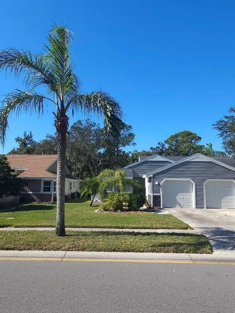 Photo of 3154 Cloverplace Drive #139, Palm Harbor, FL 34684 (MLS # O6390590)