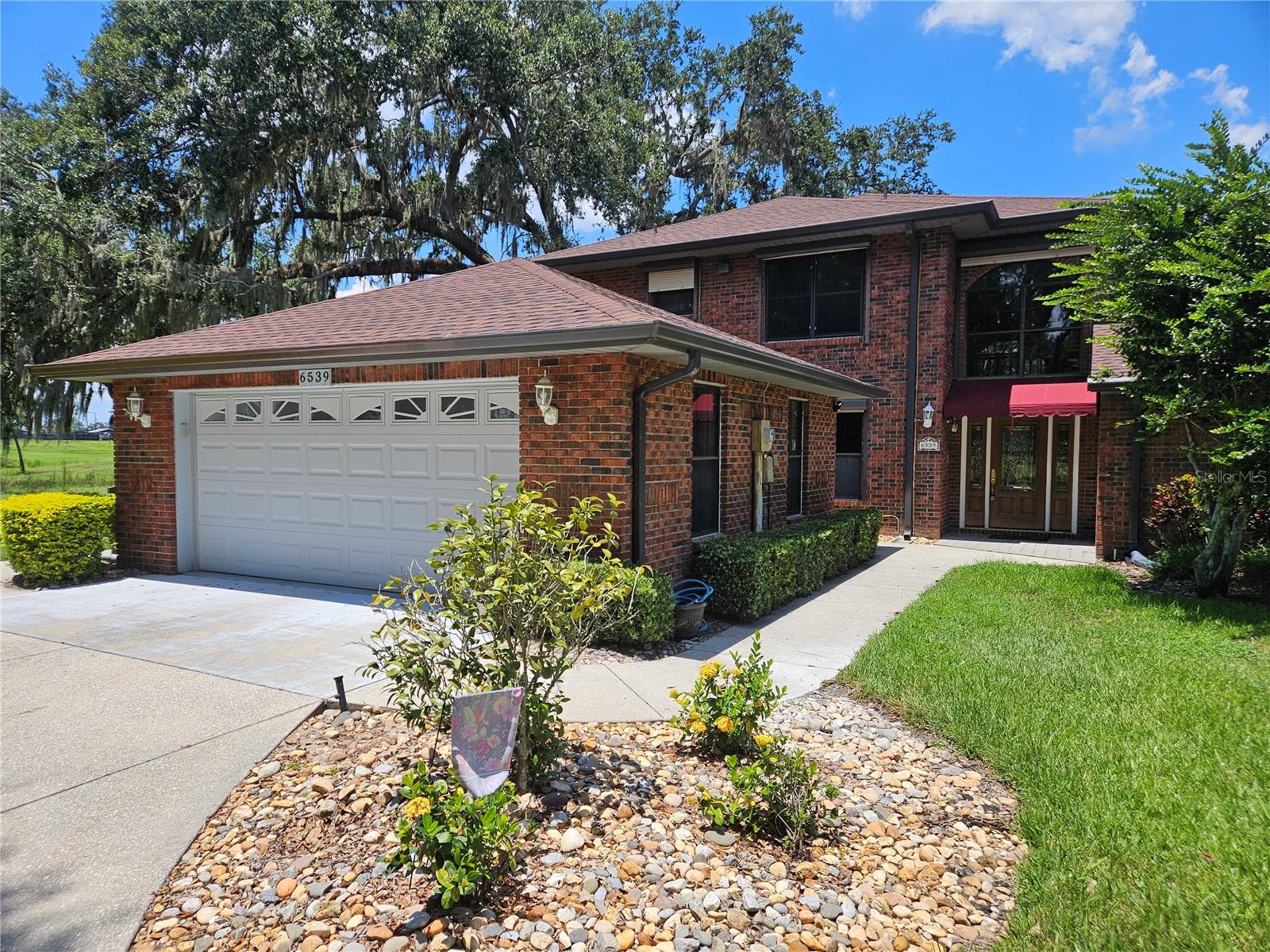 If you work from home and need a peaceful place or have a family that you want in a great neighborhood, then you owe it to yourself to see this home. Located on a quiet cul de sac and situated on the Silver Oaks golf course, this MAINTENANCE FREE VILLA offers serenity and a low stress lifestyle. Ditch that costly monthly storage unit and utilize the large 23'x23' attached garage to store your things. Home was recently renovated and feels like new. Renovations inCLude NEW PAINT, NEW VINYL PLANK FLOORING, NEW BATH, NEW KITCHEN CABINETRY, NEW GRANITE COUNTERTOPS, NEW LED LIGHTING, NEW DOOR HARDWARE, NEW TRIM, NEW TOILET, NEW CEILING FANS, AND MORE!! Lawn maintenance is included in the monthly rent. Floor plan offers a master bedroom study/retreat that works great for a home office, a loft with seating area and a wet bar, and a sun room with a kitchen pass thru that is great for entertaining. Very convenient location is 2.9 miles to local hospital, 3.4 miles to WalMart Supercenter, 3.6 miles to Lowes Home Improvement, and 2.1 miles to local restaurants. Other conveniences include 41 miles to Tampa International Airport, 14 miles to shopping malls, and 40 miles to Gulf beaches. Lease terms do not allow smoking or pets.