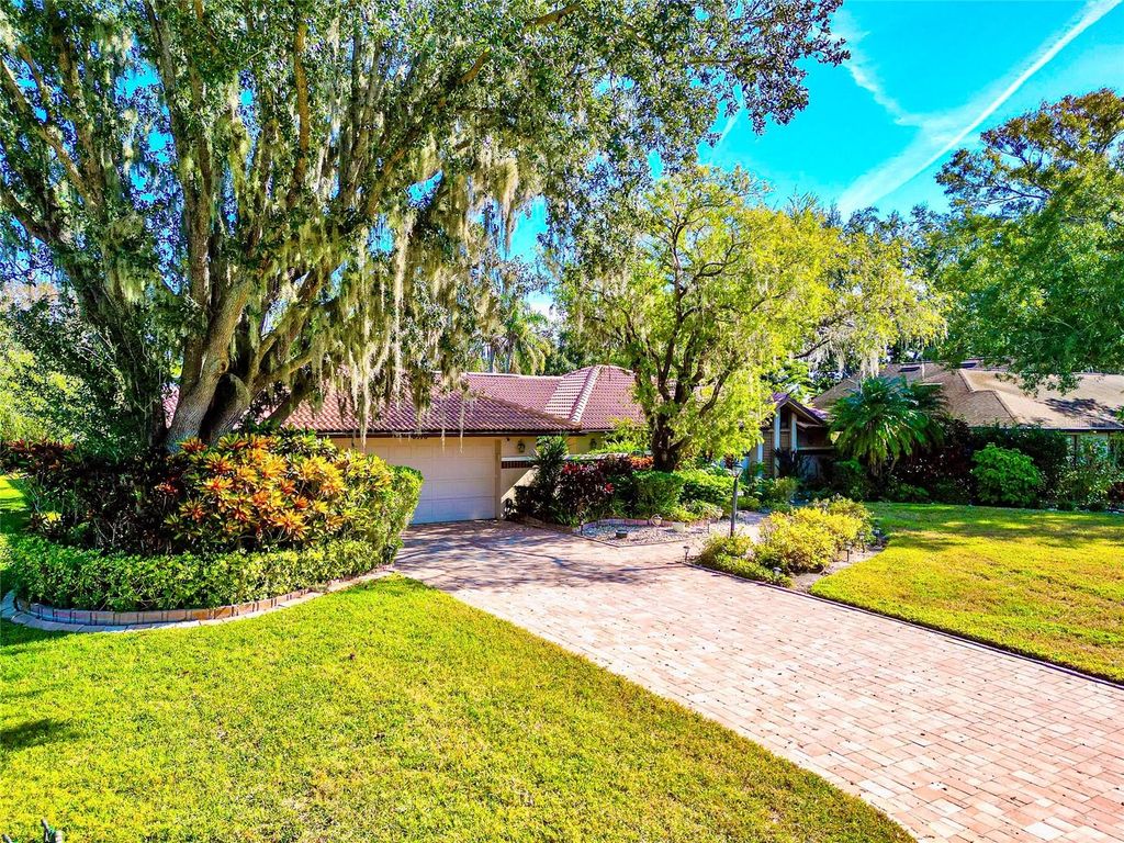 Photo of 6976 Country Lakes Circle, Sarasota, FL 34243 (MLS # A4675678)