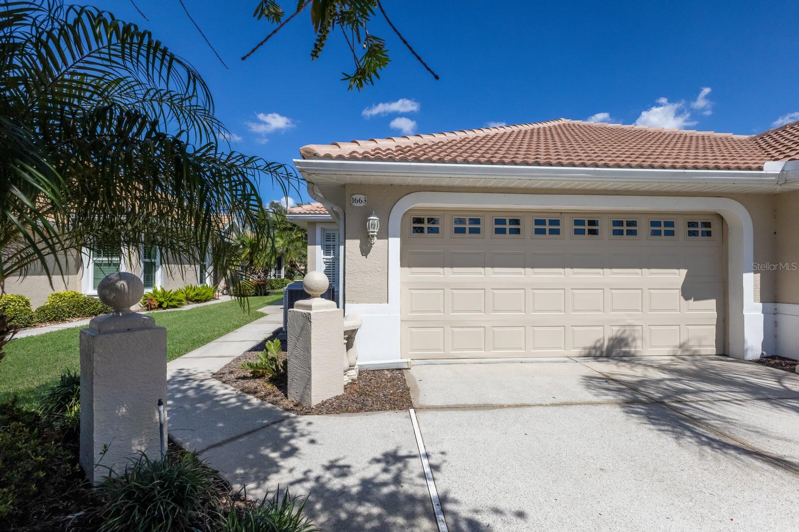 One or more photo(s) has been virtually staged. Pelican Pointe Golf and Country Club welcomes you to your dream home. This home features a NEW ROOF in 2024, 2 bedrooms, 2 bathrooms, PLUS a den, and 1496 square feet under air providing plenty of space to live and entertain while providing ample space for comfort and functionality. Imagine waking up every day in a beautifully designed home that boasts modern finishes and spacious living areas. This villa is nestled on the 15th Hole in this amenity-rich community and offers an unparalleled lifestyle for its residents. 27 holes of championship golf winds through the community offering endless opportunities for recreation and relaxation. The primary bedroom offers plenty of natural light, a tray ceiling, a huge walk-in closet plus the en-suite bath includes dual sinks, granite counters, and a walk-in shower. The second bath, on the opposite side of this villa, offers granite counters and a combo tub and shower. The kitchen provides plenty of cabinets, a generous center island all with granite tops. Pelican Pointe Golf and Country Club features a state-of-the-art fitness center, heated swimming pool, professional-class tennis and pickleball courts, perfect for staying active and socializing with neighbors. Enjoy leisurely strolls through the scenic walking trails, or spend your weekends at the community clubhouse, restaurant, bar, grill, and a library offering a constant variety of events and activities. HOA fees include maintenance fees, irrigation, exterior painting, power washing the exterior, driveway, roof, pest control, basic cable and basic internet. Conveniently located near shopping, dining, entertainment options, Venice Theatre, Venice Beach, and quaint downtown Venice. This home offers the perfect blend of luxury and convenience. Don't miss out on the chance to live in one of Venice's most sought-after communities, Pelican Pointe Golf and Country Club. Golf Membership is not required. Experience the lifestyle you deserve!