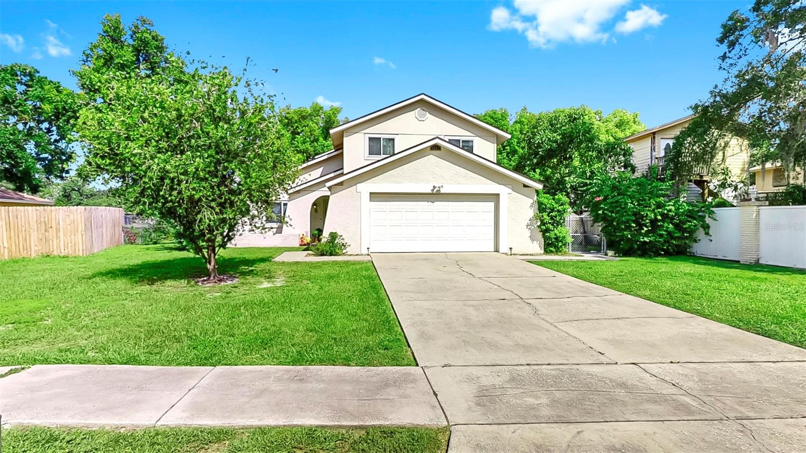 This spacious 4 bedroom, 2.5 bath residence is positioned on a generous 1/3 acre home-site with tranquil water views, located within the Turtle Lakes community in the sought-after Lutz area. Upon entry, you are welcomed by high ceilings and a well-designed floor plan, featuring premium laminate and tile flooring throughout the main living area. The kitchen has been newly remodeled and is appointed with shaker cabinets, granite countertops, a travertine backsplash, and stainless-steel appliances. All windows have been upgraded to vinyl double-pane thermal models for enhanced efficiency. The roof was replaced in 2023, while the air conditioning unit and water heater were updated in 2019. The upper level offers the Owner's suite in addition to three well-appointed bedrooms and a full bathroom. Lastly, the outdoor area provides a spacious backyard with tranquil views of the lake at the rear of the property. The lake also permits the installation of a dock if desired in the future. The Turtle Lakes community is ideally situated near excellent shopping, dining options, and provides convenient access to major thoroughfares. This wonderful property has so much to offer! Please contact us to arrange a private viewing!
