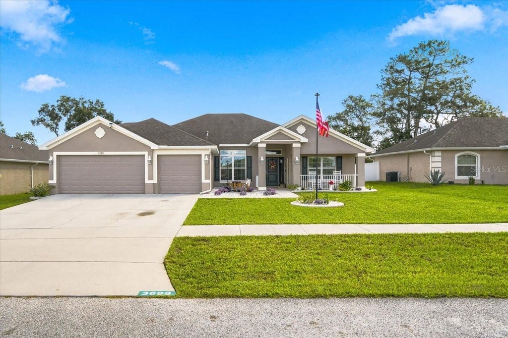 Photo of 3698 Fantasy Way, Brooksville, FL 34604 (MLS # TB8557219)