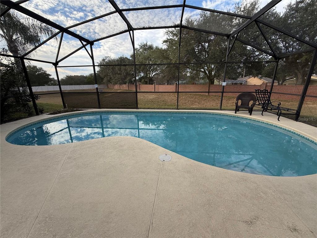 Photo of 202 S Casterton Circle, Davenport, FL 33897 (MLS # O6369519)