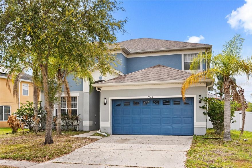 This home sits in one of the best spots in Kissimmee! Located just minutes from world-famous theme parks, the airport, major highways, shopping, and tons of great restaurants, 2863 Boating Boulevard puts you right where you want to be.

Welcome to this beautiful 2-story home offering 2,585 square feet of comfortable living space. Step inside and you'll immediately notice the open floor plan with high ceilings that make everything feel bright and airy. Hard flooring runs through the entire home, giving it a clean and modern look from top to bottom.

The kitchen is a real standout with sleek quartz countertops, stainless steel appliances, and a generous eat-in space that's perfect for casual meals or morning coffee. The modern features throughout the home give it a fresh and updated vibe that you're going to love.

All four bedrooms are located on the second floor, keeping the main level open for living and entertaining. The primary bedroom is your own private retreat, and with 2.5 bathrooms total, everyone in the house has plenty of space to get ready without the morning rush.

Out back, you'll find a screened-in porch that's ideal for relaxing on warm Florida evenings without dealing with bugs. The fenced-in yard gives you plenty of room for kids, pets, or just enjoying the outdoors in privacy.

Whether you're looking for a forever home or a smart investment in a prime Central Florida location, this property checks all the boxes. The convenience factor alone is hard to beat with everything you need just a short drive away.

Don't wait on this one — schedule your showing today and come see it for yourself!