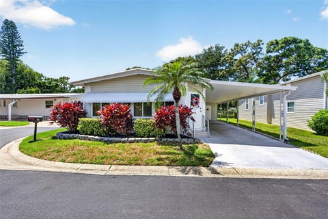 Photo of 12501 Ulmerton Road #5, Largo, FL 33774 (MLS # TB8536876)