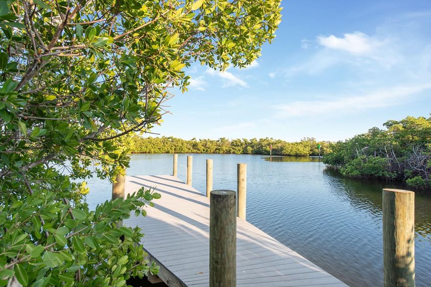 Tucked away in the heart of town sits an incredibly rare WATERFRONT HAVEN — nearly 2 ACRES along scenic Gottfried Creek with direct access to the GULF. With over 500 FEET OF WATERFRONT, a NEW COMPOSITE DOCK and a PRIVATE COVE with TWO COVERED BOAT LIFTS — you’ll enjoy effortless boating, serene wildlife views, and quiet mornings spent on the water. RECENTLY REMODELED inside with an open floor plan and large windows that bring the outside in — this home is turn-key and ready for immediate enjoyment! Major enhancements showcase true peace-of-mind living, including a 2022 ROOF, IMPACT WINDOWS & DOORS plus all new stainless-steel appliances. Uniquely designed with TWO MASTER SUITES — this home offers a split bedroom plan tucked away on opposite sides of the home and both with walk-in closets. Outside, step into your own resort featuring a 2020 CUSTOM SALTWATER SPORTS POOL with ELEVATED SPA and OUTDOOR KITCHEN—all wrapped in full-length PAVER DECKING with MARBLE TRIM and a 2021 PANORAMIC-VIEW SCREEN ENCLOSURE. From large-scale entertaining to quiet evenings at home, this property is designed for PURE WATERFRONT DELIGHT. Additional perks include an ELECTRIC SECURITY GATE, FOUR 50-AMP RV HOOKUPS for camp weekends with friends, a SPRINKLER SYSTEM, FENCED DOG RUN, and plenty of space to expand your vision. ZONED RMF-5, the options are endless—enjoy the entire estate as your private retreat or explore the possibilities of subdividing and keep the best slice for yourself. NO DEED RESTRICTIONS or RENTAL RESTRICTIONS mean income producing options, detached structures, workshops, and additional buildings are all allowed and included! Opportunities like this don’t come up twice. Located just a mile from Beach Road and Manasota Key – you can walk or bike to the beach and explore all that this charming area of Southwest Florida has to offer! Call for more information or to request a private showing.